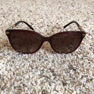 Burberry burgundy sunglasses.